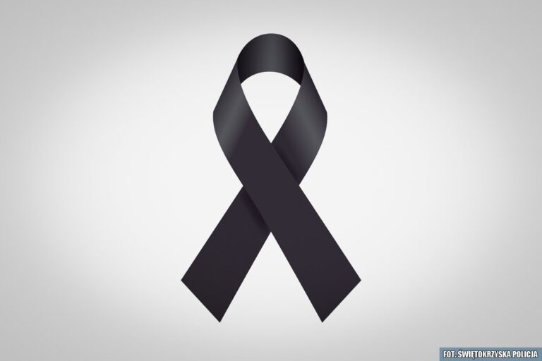 Czarna wstążka żałobna na szarym tle